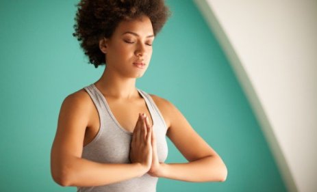 black-woman-meditating-yoga-657x400