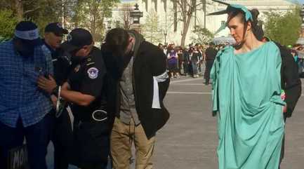 lady-liberty-getting-arrested